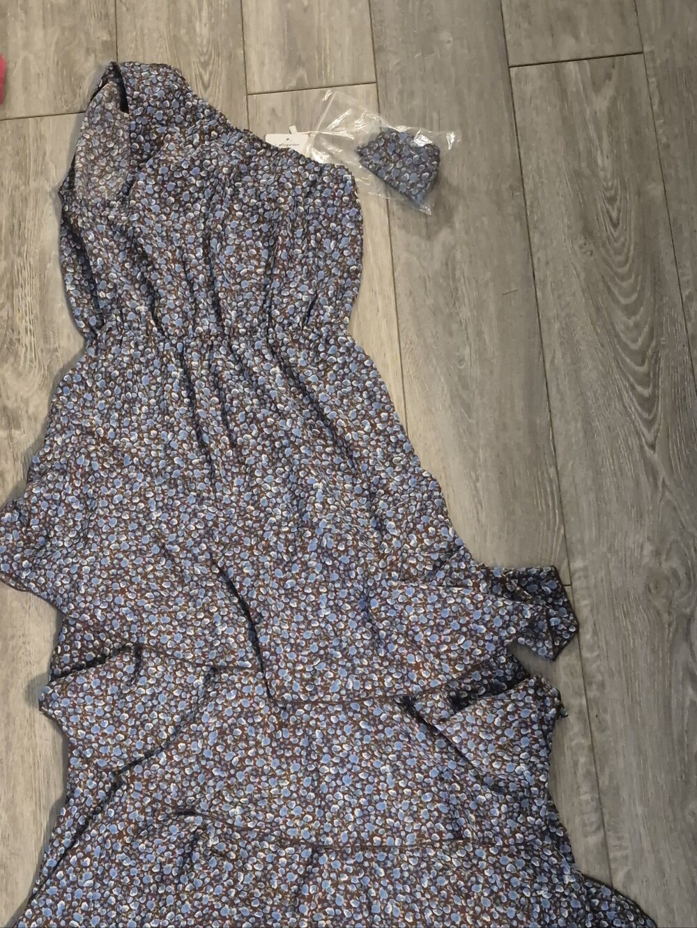 blue floral print one-shoulder tiered maxi dress.